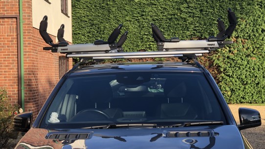 Two Thule Hullavator Pro kayak carriers fitted side by side